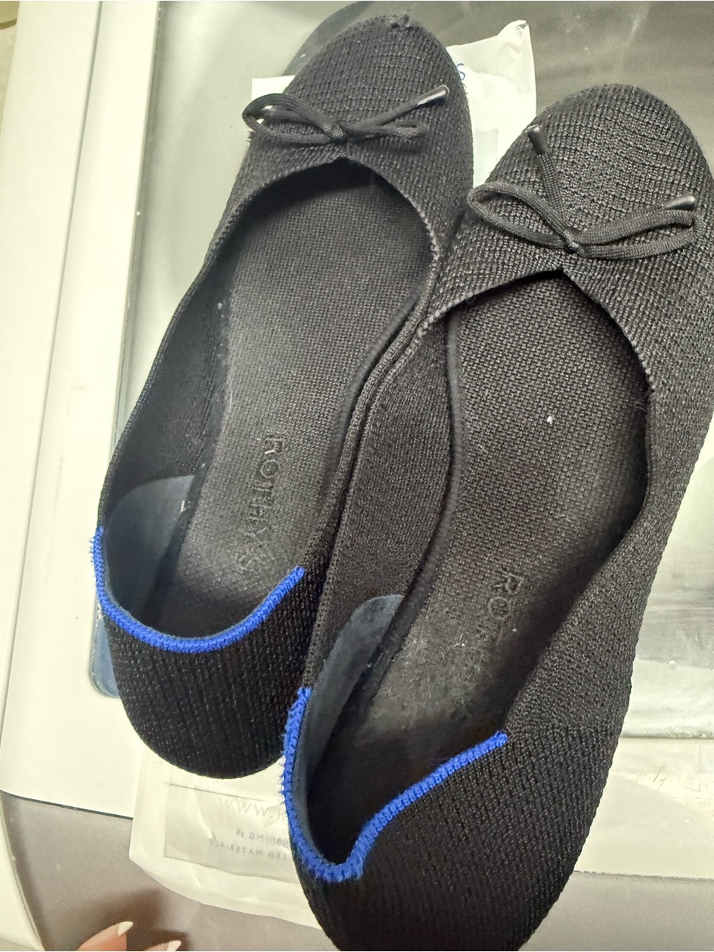 Rothy's Black Knit Ballet Flats with Blue Heel Trim